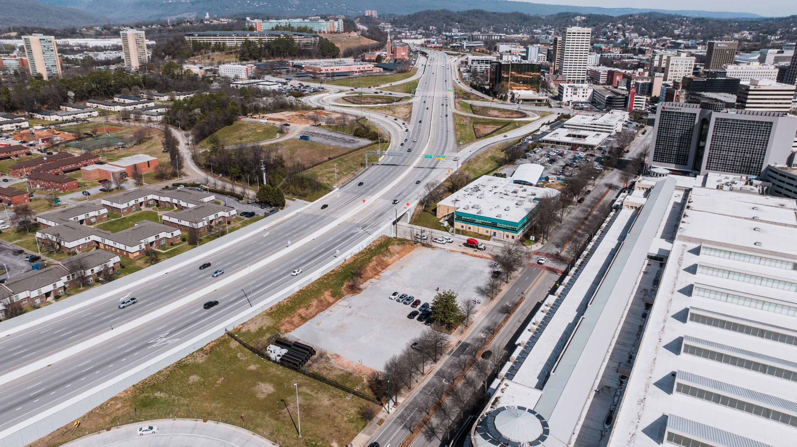 Aerial shot of Chattanooga's highways and cityscape showcasing urban development.